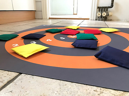 Floor Target Mat in use, covered in beanbags