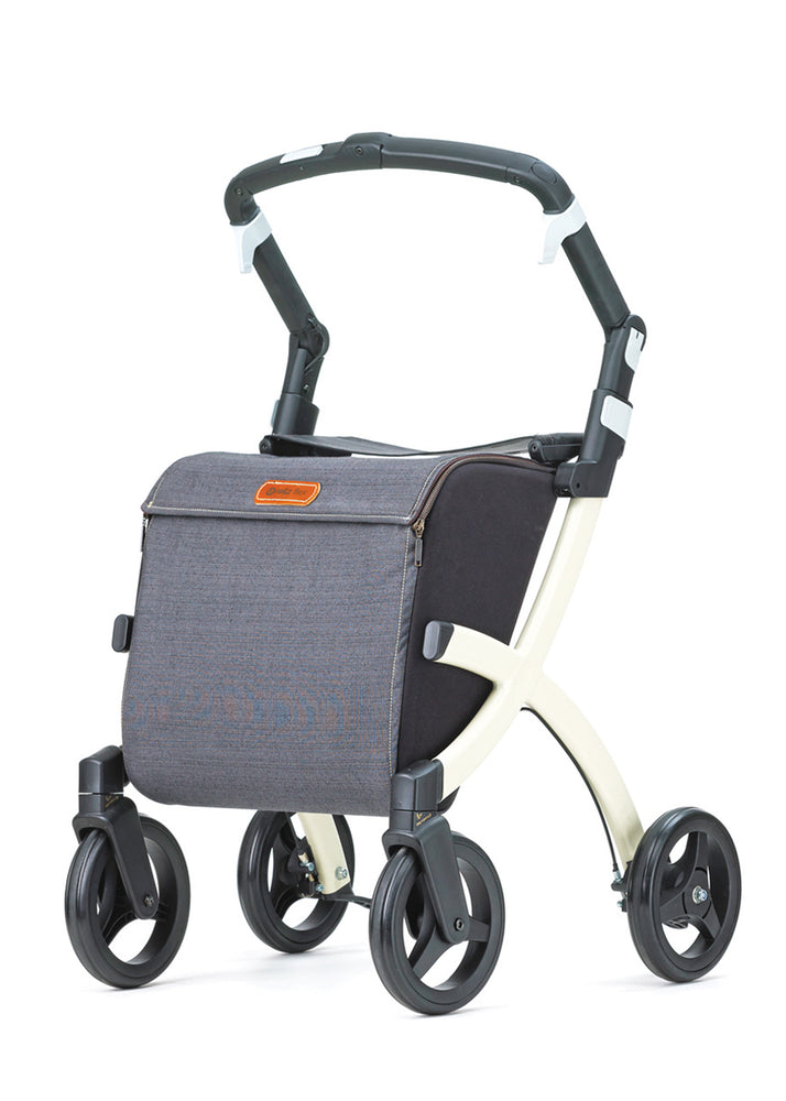 shows another white framed rollz flex rollator with a blue shopping bag