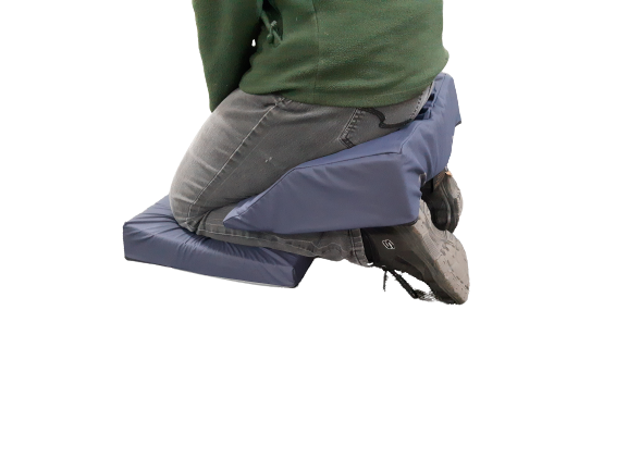 Another view of someone using the JuleCush OT/Healthcare Kneeling Cushion