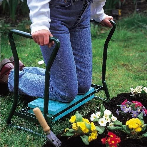 Someone using the Folding Garden Kneeler and Stool, in their garden