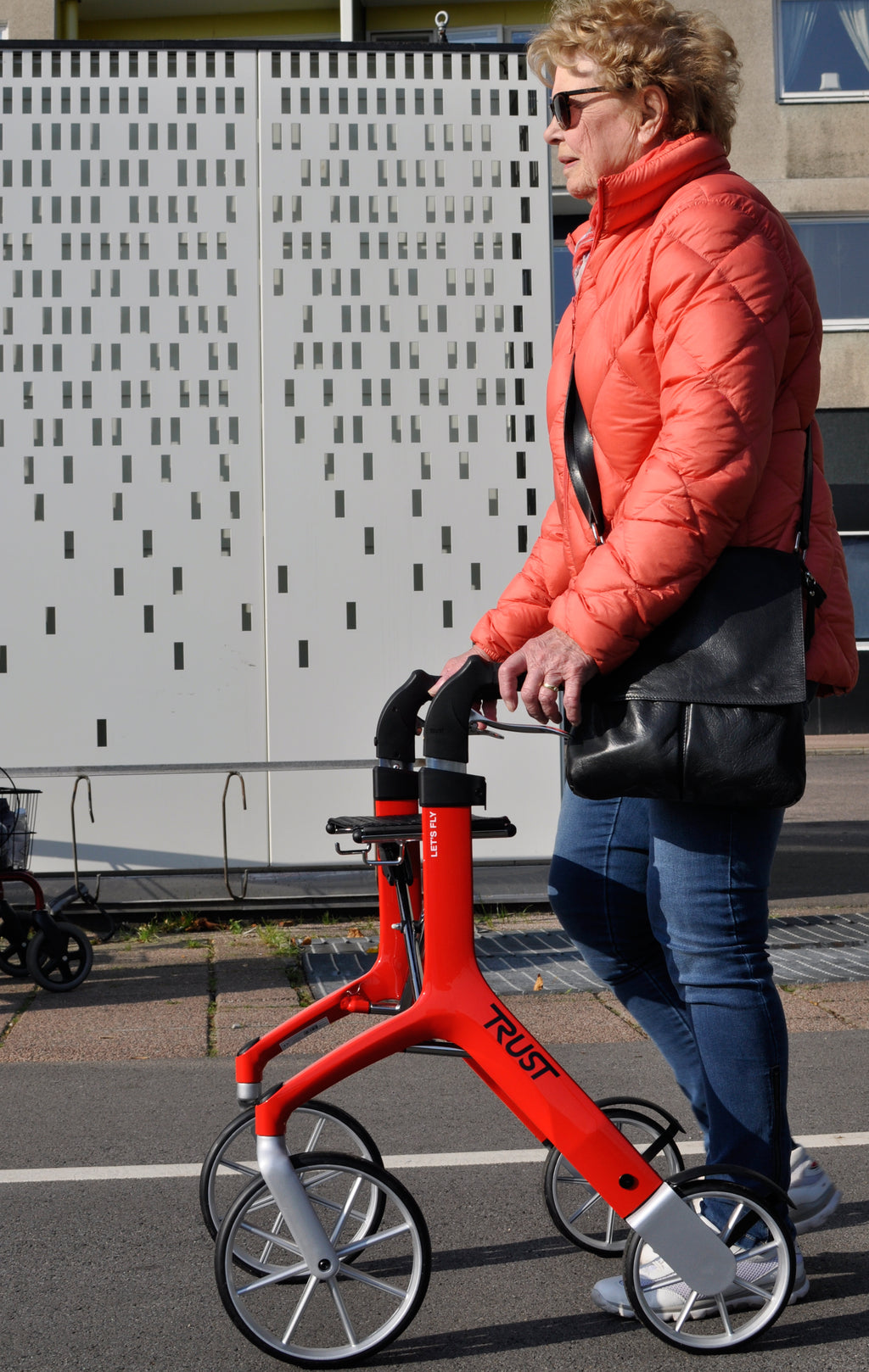 Make your trip to town easier with a red lets fly rollator