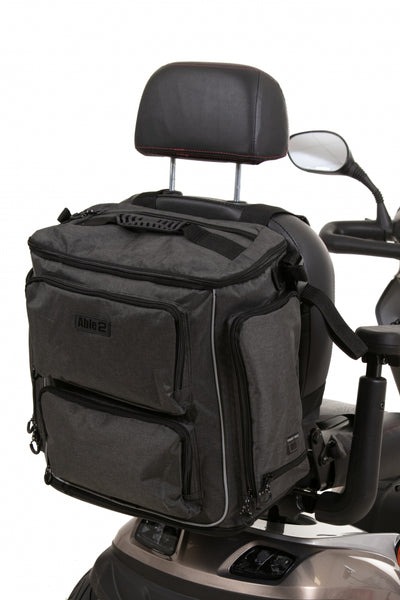 shows the Torba Luxe Premium Mobility Scooter and Wheelchair Bag on a mobility scooter