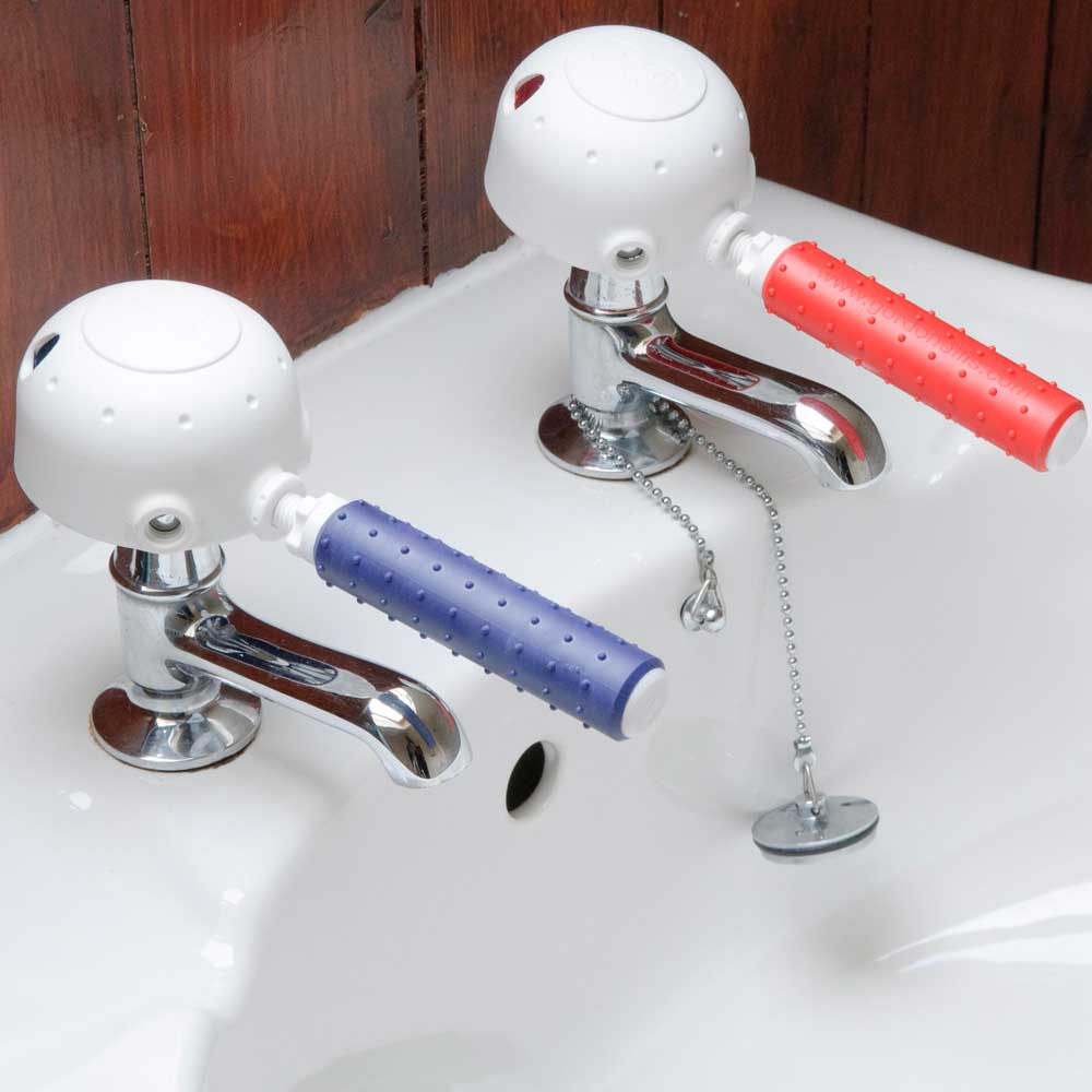 shows the Derby Tap Turners in place on bathroom sink taps
