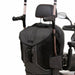 Image of the grey and black torba go back of the back of a mobility scooter, holding a pair of cruches