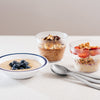 Porridge and blueberries served in a polycarbonate duo bowl