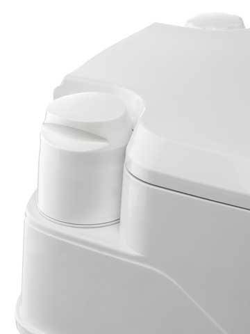 shows a close up of the porta potti 365 portable flushing toilet