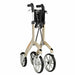 shows a folded up lets fly champagne coloured rollator