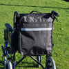 shows the Splash Wheelchair Bag in black attached to a wheelchair