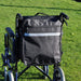 shows the Splash Wheelchair Bag in black attached to a wheelchair