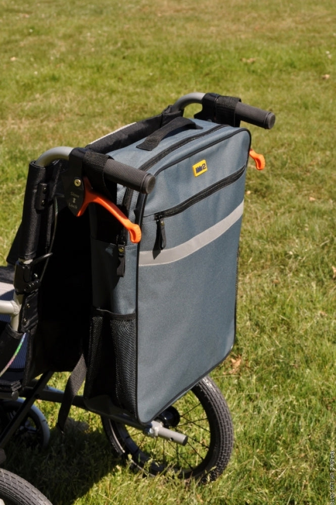 shows the Splash Wheelchair Bag in grey fitted to the push-handles of a wheelchair