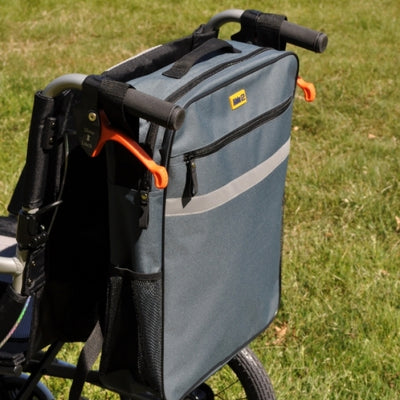 shows the Splash Wheelchair Bag in grey fitted to the push-handles of a wheelchair