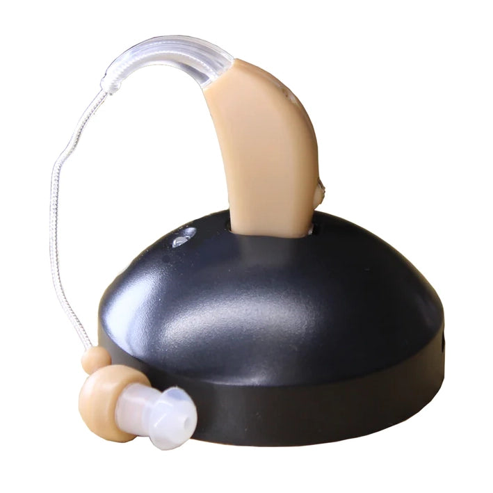 A close up of the Rechargeable Hearing Aid, being charged