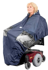 Someone on a powerchair, wearing a Wheelchair Powerchair Cape