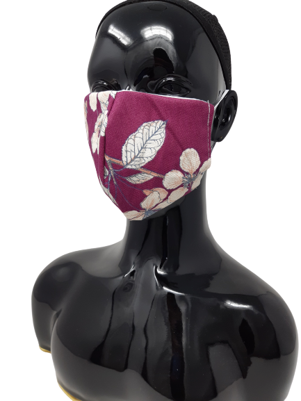 shows the washable reusable face mask in purple with flowers design