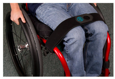 A person in a wheelchair using a Universal Elastic Strap