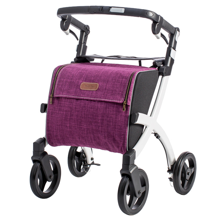 shows white framed rollz flex rollator with a purple shopping bag