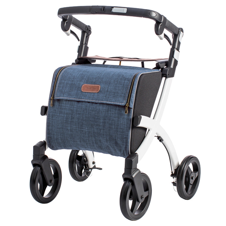 shows a white framed rollz flex rollator with a blue shopping bag