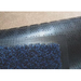 A close up of the Blue WacMat Carpet Protector