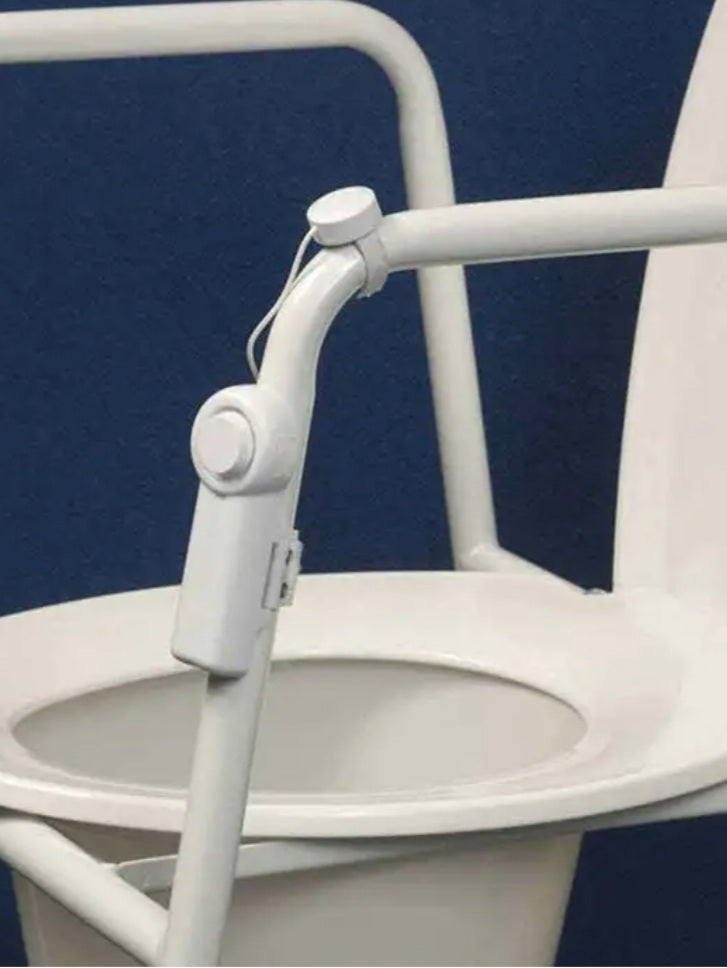 the image shows the mobility and toileting aid alarm attached to a toilet frame