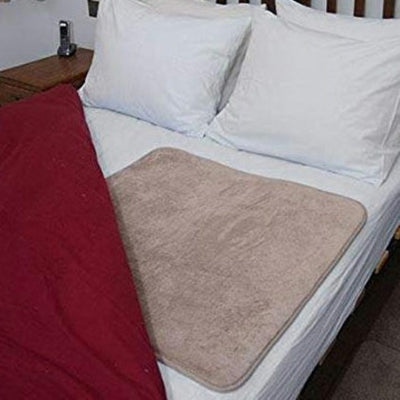shows the hip fleece, in a bed