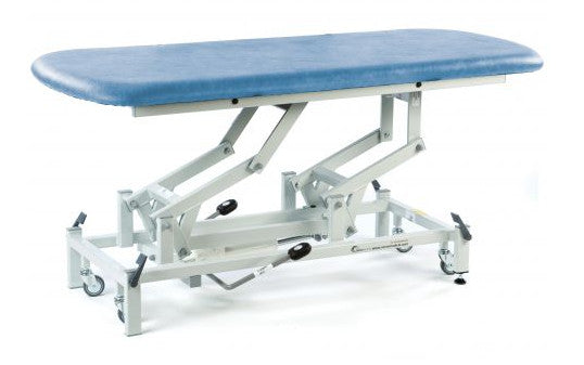 the image shows the sky blue coloured therapy hygiene table