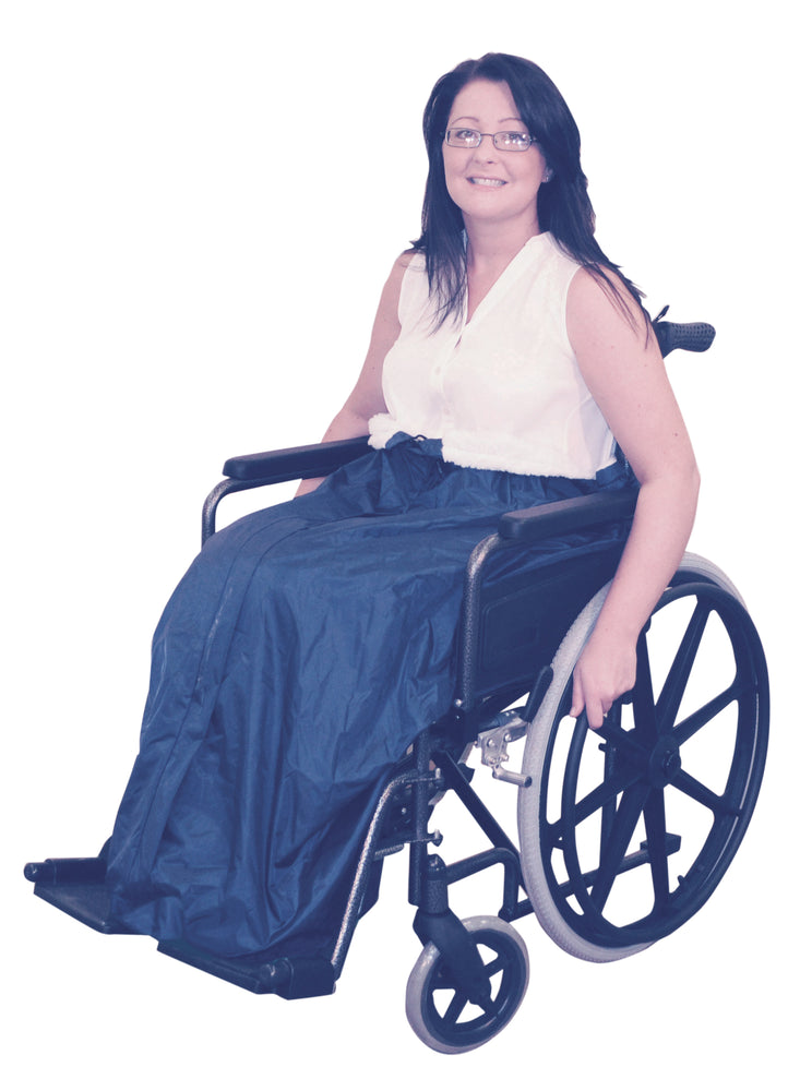 the image shows a woman in a wheelchair, wearing the wheelchair fleece leg cosy