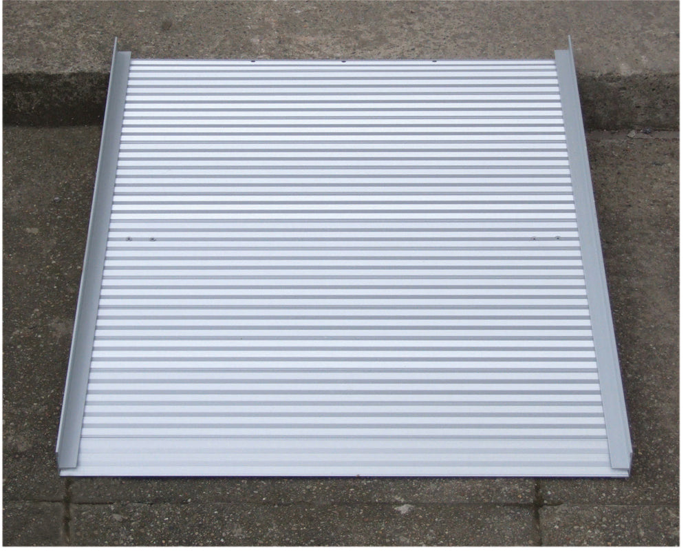 the image shows the roll up aluminium ramp