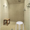shows a white multi-purpose adjustable stool placed beneath a shower head in a wetroom