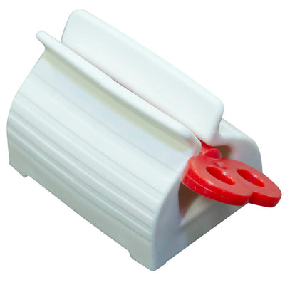 shows a close-up of the tube squeezer with red turn key