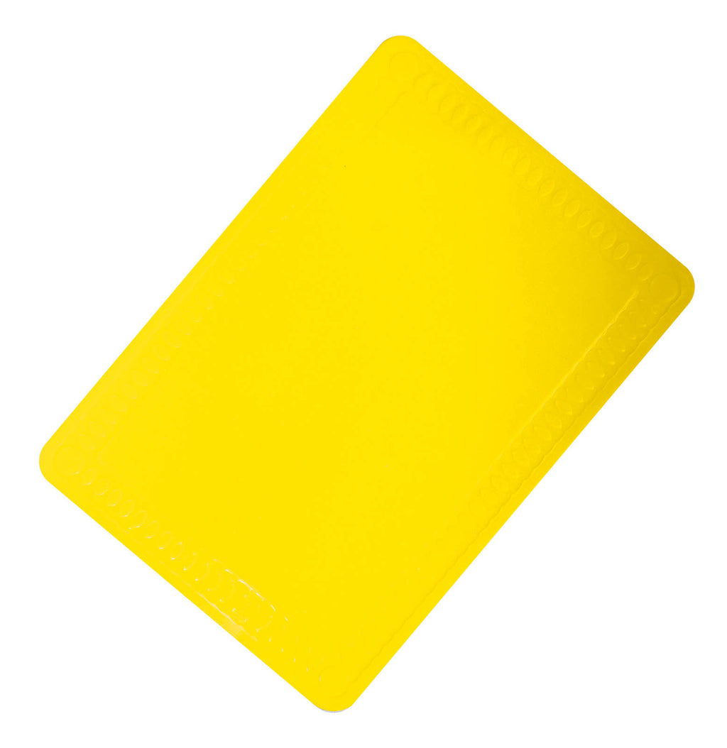 shows a yellow anti slip silicone table mat