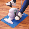 shows someone using a pedal exerciser on a large non slip silicone mat in blue