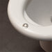 shows a close up of the one touch button on the e'loo one touch seat