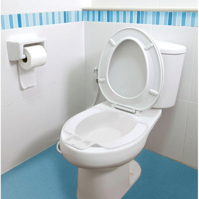 shows the portable bidet bowl in place on a toilet