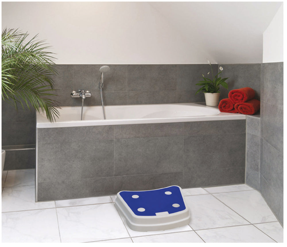 shows the stackable bath step next to a bath