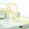 A diagram showing how the food workstation can be used to hold a loaf of bread securely, so it can be safely sliced.