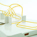A diagram showing how the food workstation can be used to hold a loaf of bread securely, so it can be safely sliced.