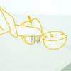 A diagram showing how the Food Workstation can be used to hold an apple securely, so it can be safely sliced