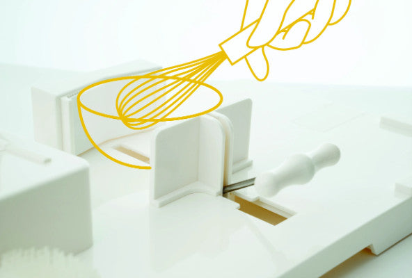 A diagram showing the food workstation can be used to hold a bowl secure while yo whisk the contents