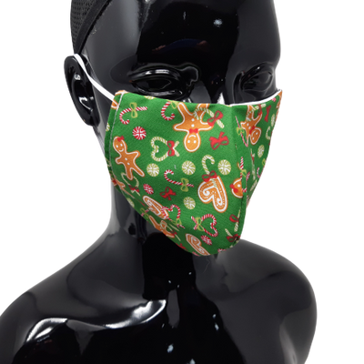 shows the gingerbread man and candy cane design christmas face mask