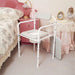 Picture of the Homecraft Uni-Frame Folding Commode in a Pink elegant bedroom