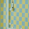 An Ashby Grab Rail Shower Kit fitted onto a tiled bathroom wall