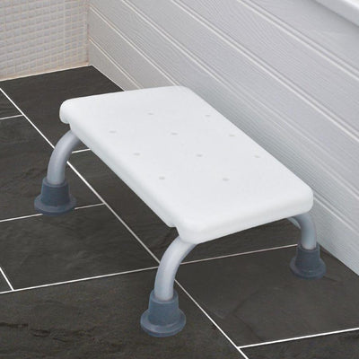 shows the aluminium bath step with non slip feet in a bathroom