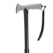 the image shows the white handle of the black walking stick