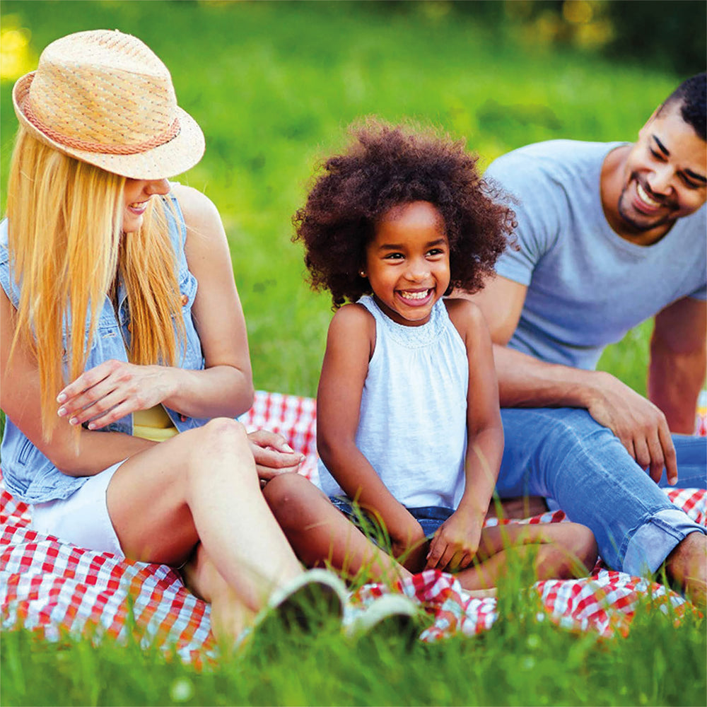 Family enjoying fleece outdoor blanket