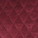 A close up of the diamond pattern on the Maroon Velour Floor Pad