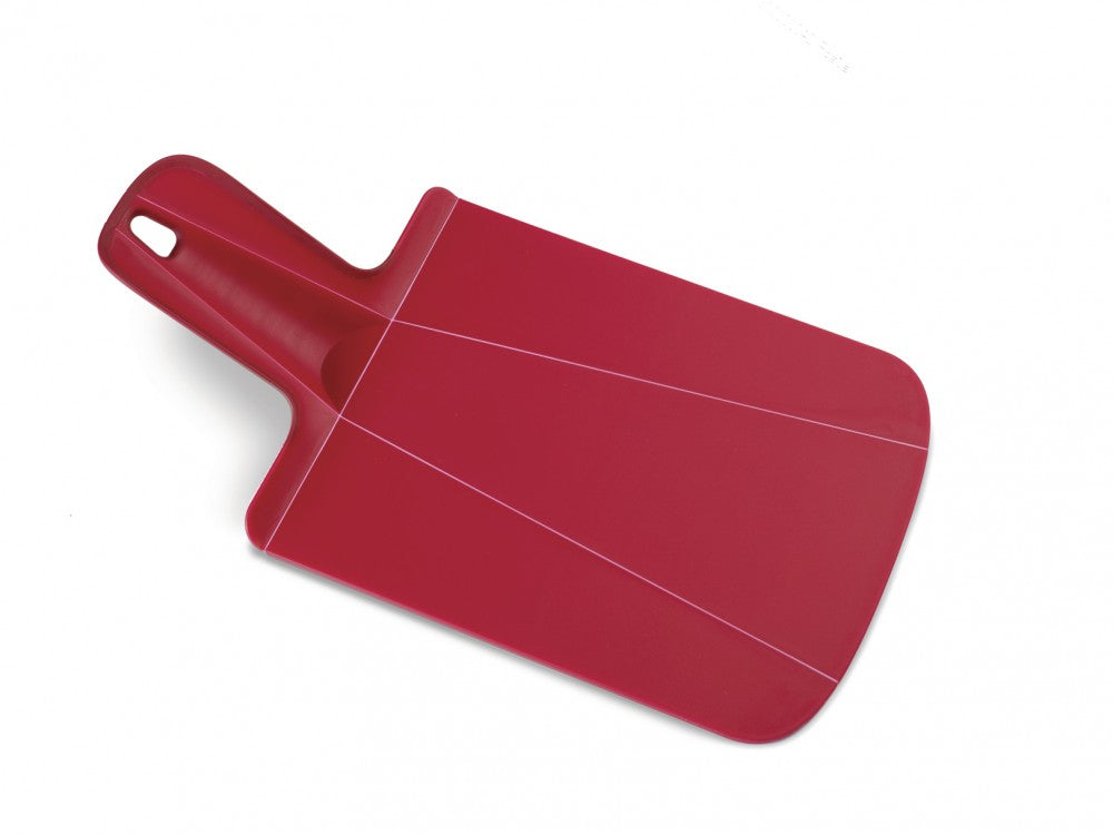 shows the josephjoseph chop 2 pot folding chopping board in small