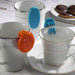 a blue and an orange level indicator on a mug and a teacup