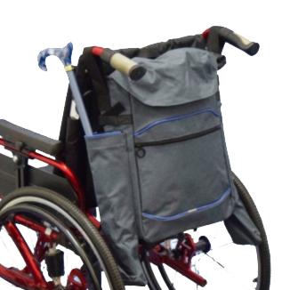 shows the crutch / stick holder bag for wheelchairs, attached to the back of a wheelchair with a folding walking stick / cane in one of the side pockets