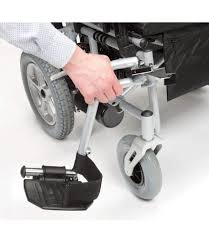 shows a person's hand moving the adjustable, swing-away footrests on the Cirrus Powerchair