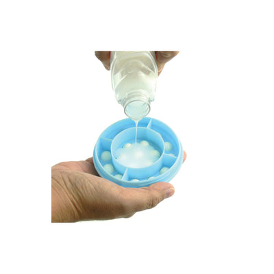 The image shows the applicator reservoir being filled with lotion